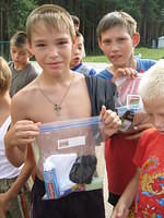 Kids and their care bags.