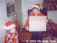 Artur and Alla Fillmon prepare to distribute toys to the children.