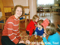 His Kids, Too! Board Member, Nikka, enjoys showing the kids how to play with their gifts!