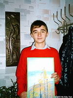 Maxin, 15yrs. old, is a very accomplished artist, his work is wonderful.  Pictured here with a masterpiece, this will be feature