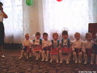 The children are all in place, waiting for the show to begin!