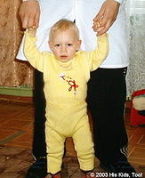 This little boy is just learning how to walk.