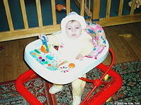 This girl enjoys her mobility that the walker provides.
