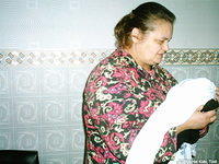 This lady is quite pleased she received a gift.