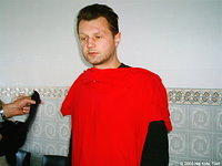 This man receives a new shirt.