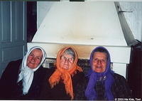 Three of our dear sisters and widows.  They were very thankful for the food.