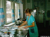 This orphanage cook prepares delicious meals each day for the 50+/- residents of this facility.