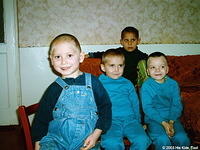 These young children appreciate their new clothing!