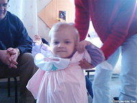 This little girl will enjoy here new dress.