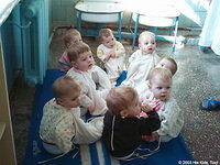 Pictured here babies are being potty trained, they are only 1 yr. to 15 months old.