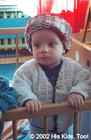This cutie is adorable in her new hat and sweater!