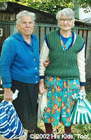 These two dear widow sisters were thrilled when they received their food bags. Each bag was filled with, cheese, sugar, flour, r