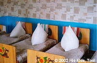 This room has received some repairs of new wall paper, with matching blankets, and flooring. The children are very pleased with
