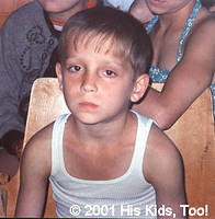 This young boy (Oleg) seems very sad at his living situation.