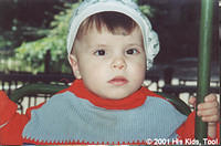 The precious girl has a diagnosis of autism.  She was adopted in October 2002.