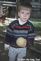 Despite recent arm surgery, this boy has a cheerful spirit, and loves to play ball. (Update, Sasha, has been adopted)