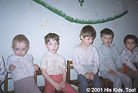 These children, all patients at a local children's orthopedic hospital, await dinner.