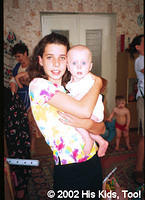 His Kids, Too! Volunteer, Haley loves to hold