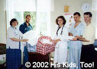His Kids, Too! Director, Teresa, and board members,