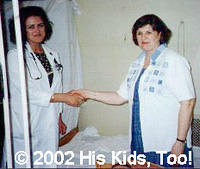 Lynn A, His Kids, Too! board member with one of the doctors of the hospital in Kyiv