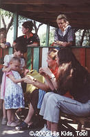 His Kids, too! Director shares a bracelet with little Oksana (update, she has been adopted)
