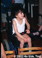 Thanks to Whitmyer Biomechanix, Inc. this young boy is no longer tied to a chair, but is able to go outside and have new found f