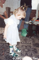 Taking a look at her new "feet." (she has legs but no feet)