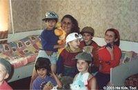 Volunteer, Ms. Judy loves on the children which she helped dress.