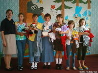 These young ladies are very pleased with their new things.