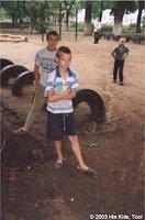 This young man was given clothing and shoes.