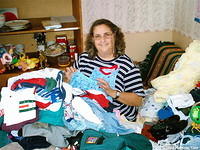 Judy enjoys being responsible for the infant clothing and toys!