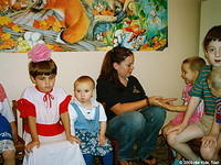Lydia visits with the kids.
