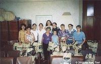 Group of volunteers and the completed bags.