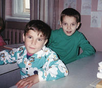 Sergie (in the print shirt) is quite an acrobat. Both boys like their new clothing.