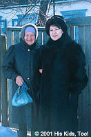 This sister hand delivers a food baskets to a local widow.