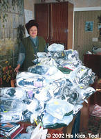 Local internot director is thrilled with the 110 pair of shoes, 300 pair of socks, games balls and more that His Kids, Too! prov