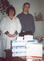 Local Orthodedic Hospital director receives mixer, syringes, and other Medicine from the U.S. His Kids, Too! volunteer.
