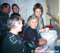 Local ladies bible study group preparing food bags